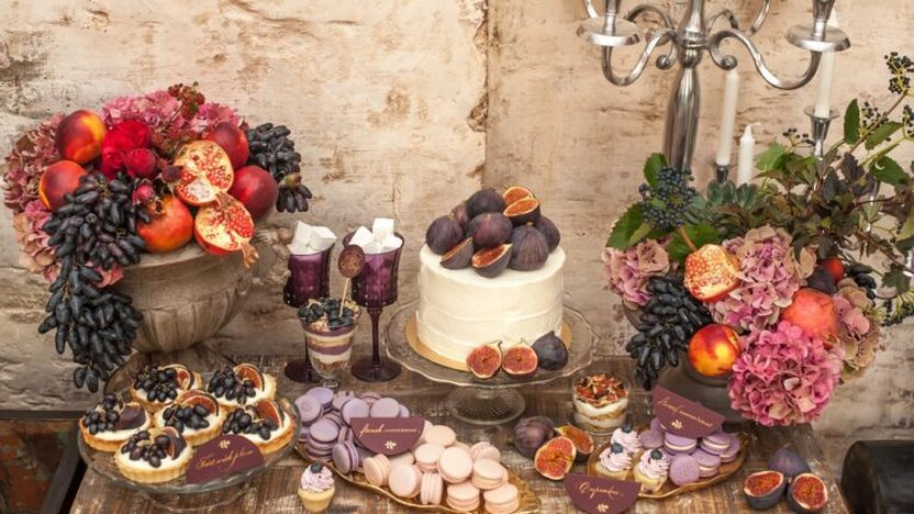 image of wedding cake and pastries on a fall decorated table - meeting spaces - lafayette la - Le Pavillon