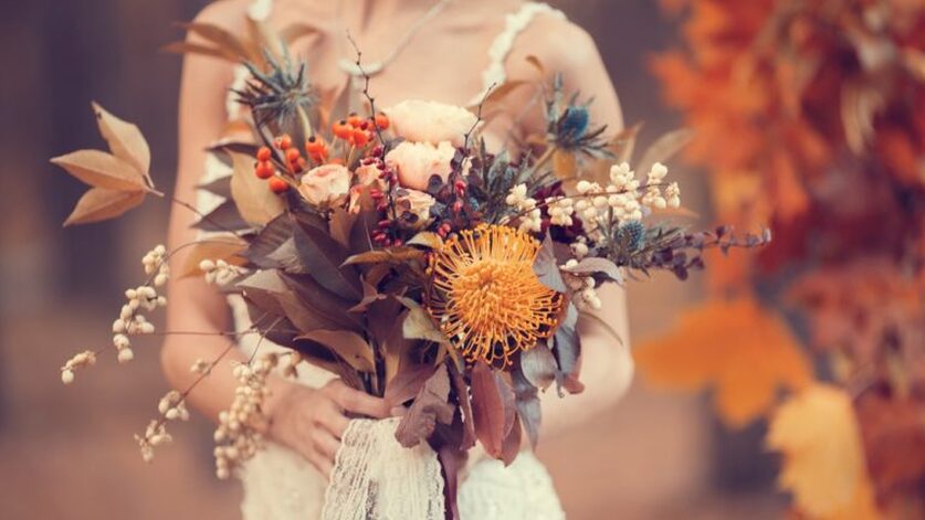 Image of a fall bouquet held by a bride - wedding reception halls - lafayette la - Le Pavillon